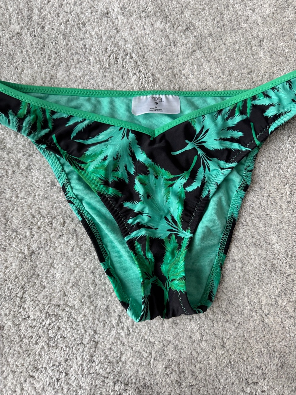 Fe Noel x Target Black and Green Palm-Print Wrap Bikini bottoms.